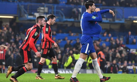 Chelsea’s Álvaro Morata, right, celebrates scoring the team’s second goal deep into injury time, a celebration apparently referring to his wife’s recent pregnancy and which earned him a fifth booking of the season.