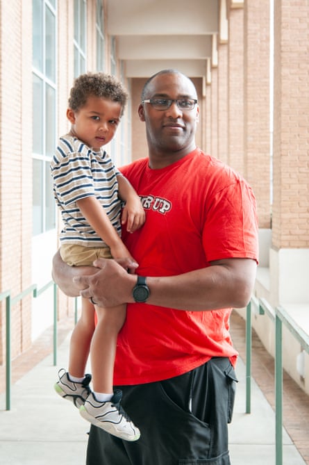 a man holding a child