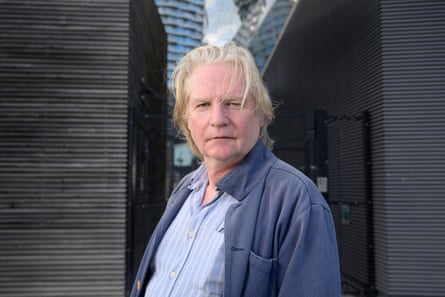 Trevelyan Evans wearing a blue workwear jacket and blue shirt