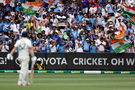 Indian supporters celebrate the wicket of Australia's Travis Head at the MCG last year.