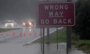 The Pacific Highway off-ramp at Mudgeeraba is closed due to flooding following Cyclone Debbie, 30 March 2017.