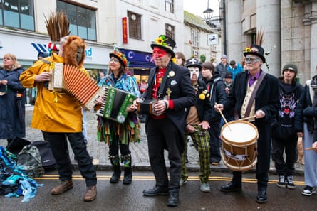 Musicians play tunes for the morris dancers.