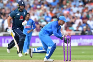 Plunkett, run out by Dhoni.