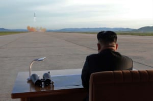 North Korean leader Kim Jong-Un inspects a launching drill of the medium- and long-range strategic ballistic rocket Hwasong-12 at an undisclosed location last month.