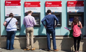People using cash machines in Newcastle upon Tyne