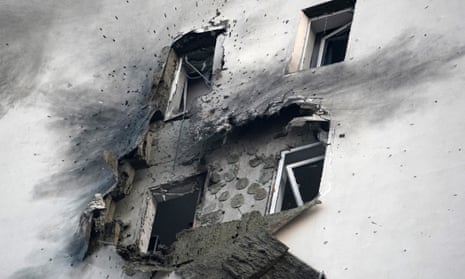 A view shows a damaged apartment building in a residential complex following a drone attack in the village of Sapronovo in the Moscow region.