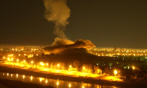 Smoke billows from an explosion in Iraqi president Saddam Hussein's presidential palace in Baghdad during a coalition air raid early on 2 April 2003.