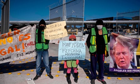 A man protests family separation at the San Ysidro border crossing in Tijuana, Mexico.