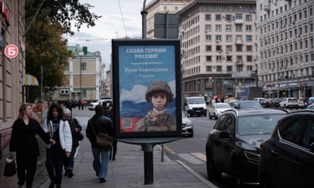 A poster in the centre of Moscow of a Russian soldier that proclaims ‘Glory to the Russian heroes.’