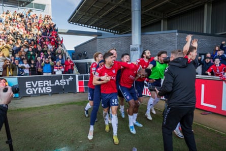 York City celebrate Malachi Fagan-Walcott’s injury-time winner against Altrincham.