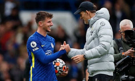 Chelsea’s Mason Mount clutches the match ball as he celebrates victory with his manager Thomas Tuchel.