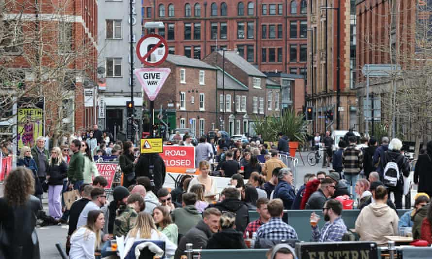People in Stevenson Square in Manchester