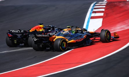 Max Verstappen in his Red Bull (left) clashes with McLaren’s Lando Norris in the US Grand Prix, with both going off the track to trigger a controversial penalty for the British driver.