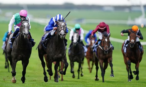 Zanbaq (second left) is victorious on day two of the Cambridgeshire meeting at Newmarket.
