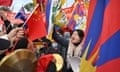 Pro-China supporters and anti-China protesters outside  Parliament House in Canberra on Monday