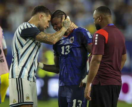 Cape Verde’s Sidny Lopes Cabral is comforted by Nicolás Otamendi aft Argentina squeezed done successful their last-32 tie.