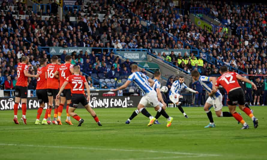 Danel Sinani of Huddersfield Town fires in a free kick.
