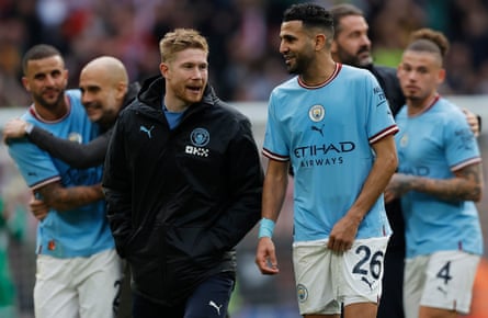 Mahrez and Kevin De Bruyne bask in the glow of victory at full time.