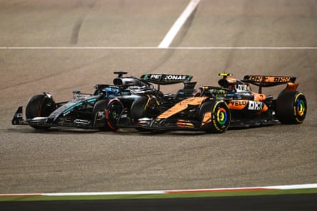 George Russell’s Mercedes leading Lando Norris in his Mclaren