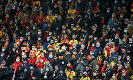 Lens fans watch their team play Lille at the Stade Bollaert-Delelis.