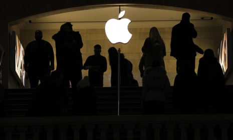 People shop in an Apple retail store in Grand Central Terminal Tuesday in New York City.