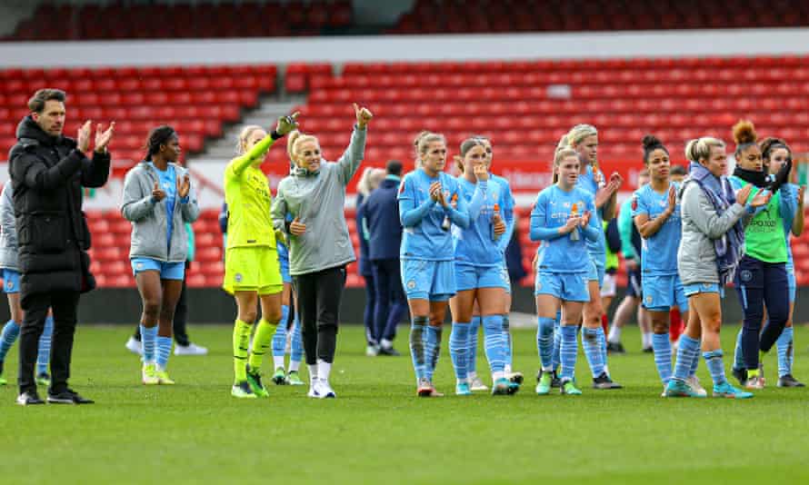Women’s FA Cup photo essay – road to Wembley, fourth round: Nottingham Forest v Manchester City | Women's FA Cup 26 Manchester City manager Gareth Taylor and his players celebrate with the fans after the match.