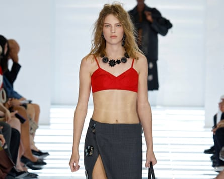 a model walks on the runway