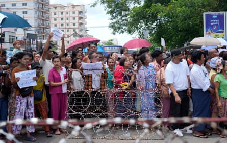People waiting outside the prison gates