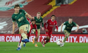 Sheffield United’s Sander Berge scores their first goal from the penalty spot .