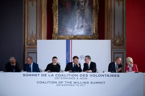 France’s Emmanuel Macron surrounded by European leaders during a meeting of the Coalition of the Willing in Paris last night.