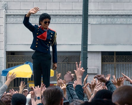 Man waving to fans