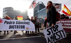 Demonstrators protest outside the European parliament in Strasbourg against Pedro Sanchez’s draft amnesty law