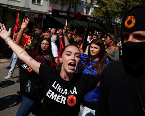 Supporters of former Kosovo President Hashim Thaci protest after he was found guilty of war crimes by the Kosovo war crimes tribunal in The Hague, in Pristina, Kosovo.
