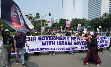 Protesters march in Jakarta against Israel's participation in the Fifa men’s Under-20 World Cup, which was due to be held in Indonesia this year