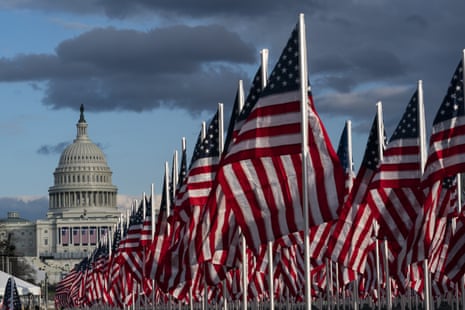 American flags are placed on the National Mall, with the US Capitol behind, ahead of the inauguration of President-elect Joe Biden and Vice President-elect Kamala Harris.
