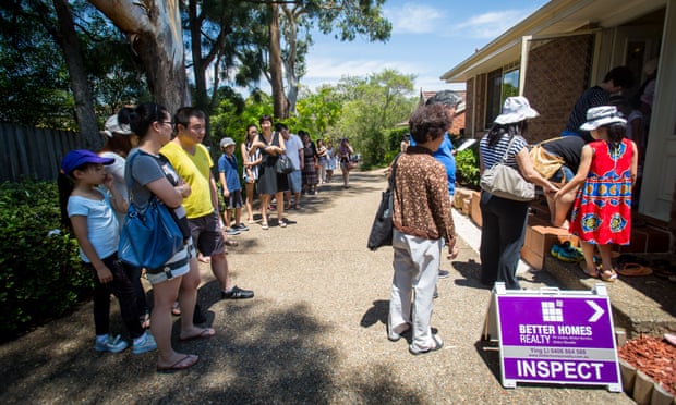 Prospective buyers wait to inspect a house for sale in Sydneys Eastwood suburb.