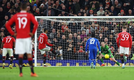 Manchester United's Marcus Rashford scores their third goal from the penalty spot.