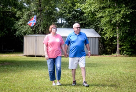 Lindy and Ira Isonhood walk along Deer Hollow, their property in Copiah County, Mississippi.