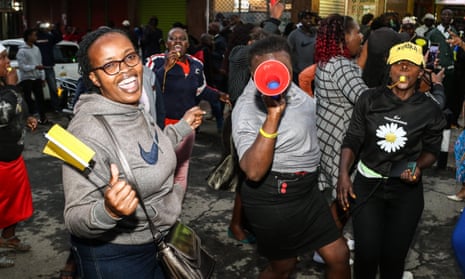 Women celebrate the election results on the streets of Nakuru, Kenya, this month.