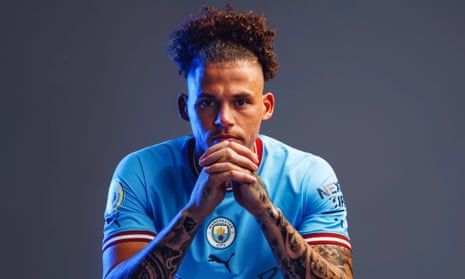 Kalvin Phillips in a Manchester City shirt after his transfer from Leeds was completed.