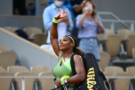Serena Williams acknowledges the crowd as she leaves the court.