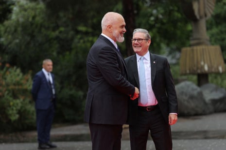 Keir Starmer being welcomed by Edi Rama, PM of Albania (left) as he arrived for the European Political Community Summit at Skanderbeg square in Tirana.