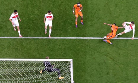 Mert Müldür (right) of Turkey gets a touch on the ball as he tussles with Cody Gakpo of the Netherlands resulting in an own goal which gives the Dutch side the lead.