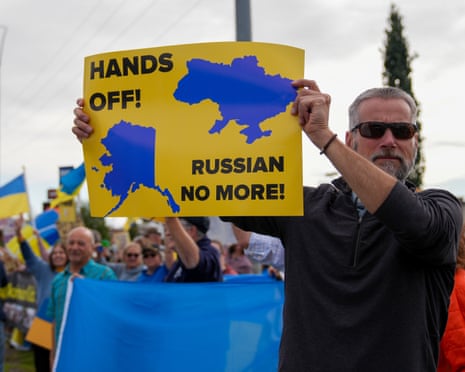 Ukraine supporters gather in a demonstration ahead of the meeting between US president Donald Trump and Russian president Vladimir Putin in Anchorage, Alaska, waving flags and holding signs in solidarity with Ukraine.