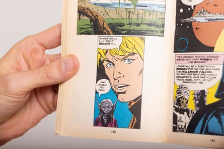 Hands holding a Marvel Comics illustrated version of The Empire Strikes Back.