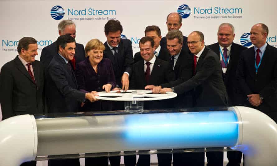 German Chancellor Angela Merkel and then Russian President Dmitry Medvedev (centre left and right), opening a symbolic valve during an inaugural ceremony for the first of Nord Stream’s twin gas pipeline in 2011.
