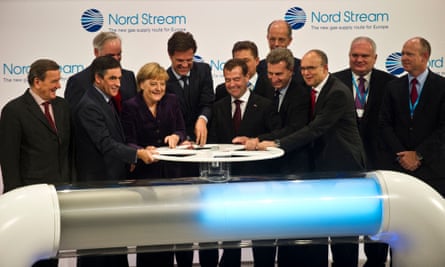 German Chancellor Angela Merkel and then Russian President Dmitry Medvedev (centre left and right), opening a symbolic valve during an inaugural ceremony for the first of Nord Stream’s twin gas pipeline in 2011.