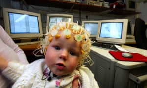 Catriona, four-months-old, with a Geodesic Sensornet on her head at the Baby Lab