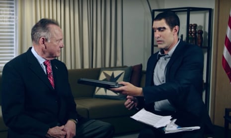 Sacha Baron Cohen in character interviews ex GOP candidate Roy Moore and plays prank with 'paedophile detector' gadget for which Moore tried to sue.