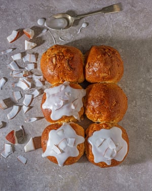 Oven-fresh: iced coconut buns.